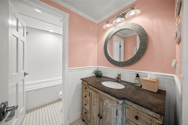 full bathroom with shower / bath combination, vanity, toilet, crown molding, and tile patterned floors