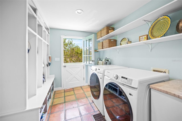 washroom with separate washer and dryer