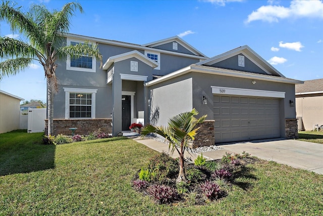 view of front of property with a garage and a front yard