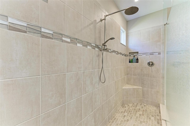 bathroom featuring a tile shower