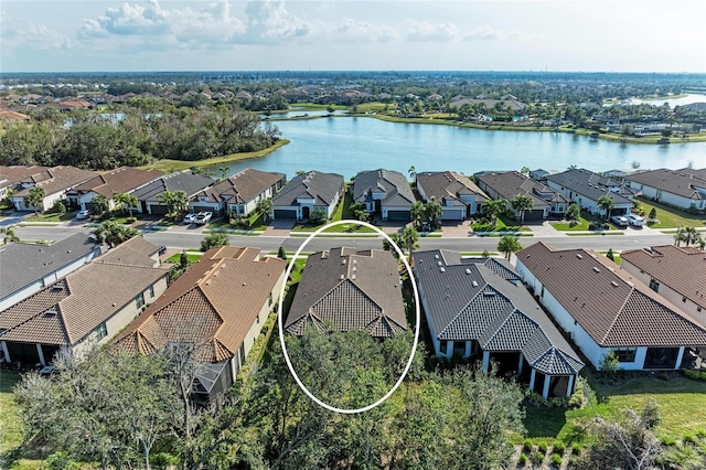 drone / aerial view featuring a water view