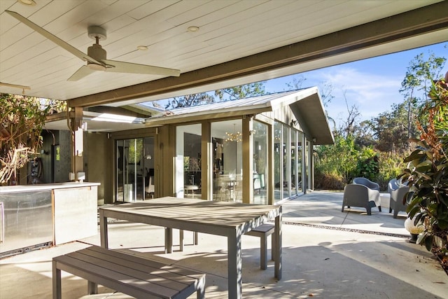 view of patio with ceiling fan