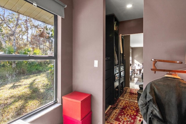 bedroom featuring multiple windows