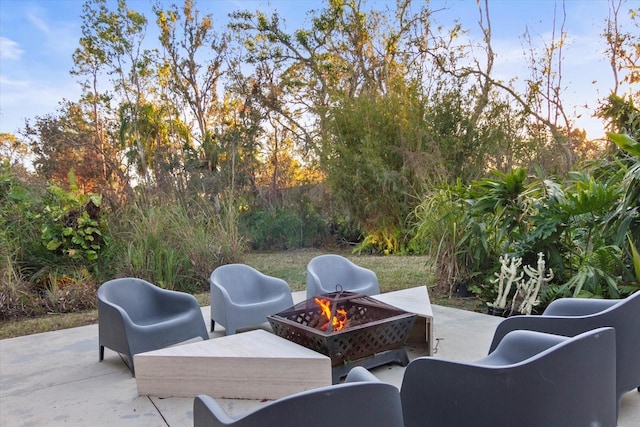 view of patio / terrace featuring a fire pit