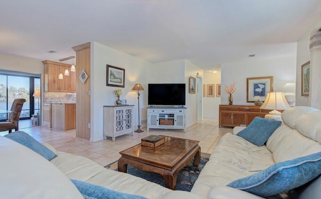 living room featuring light tile patterned floors