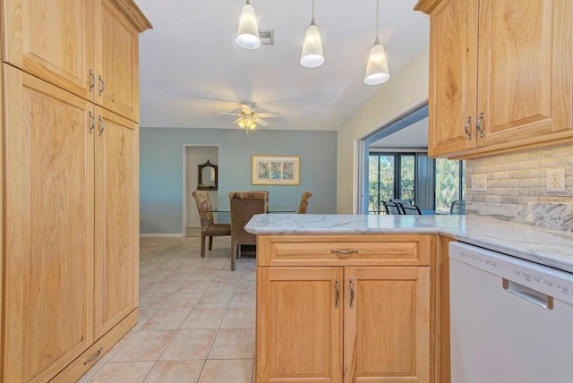 kitchen with light tile patterned flooring, light brown cabinetry, hanging light fixtures, white dishwasher, and kitchen peninsula