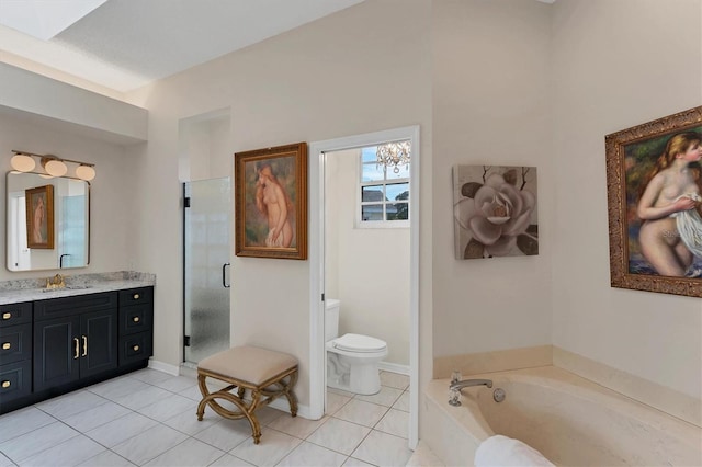 full bathroom featuring vanity, tile patterned floors, toilet, and separate shower and tub