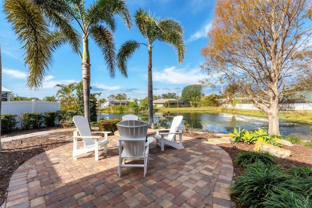 view of patio featuring a water view