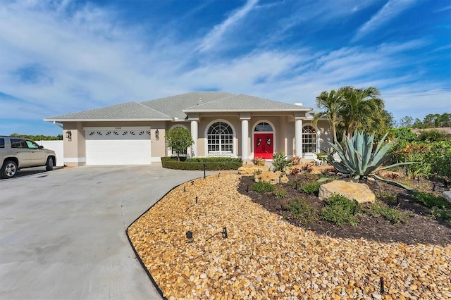 view of front of property featuring a garage