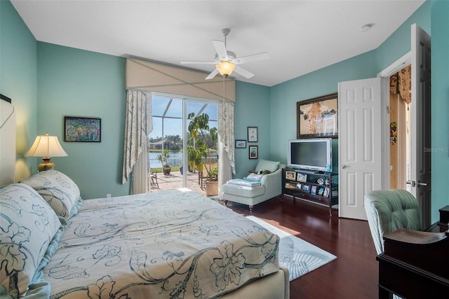 bedroom featuring ceiling fan, access to exterior, and dark hardwood / wood-style flooring