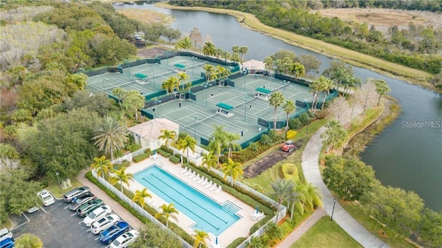 birds eye view of property featuring a water view