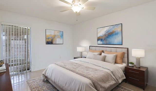 bedroom with multiple windows and ceiling fan