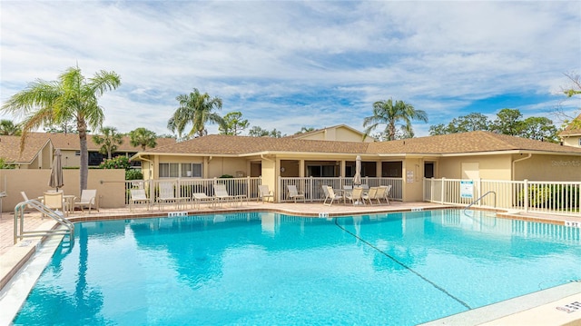 view of pool featuring a patio