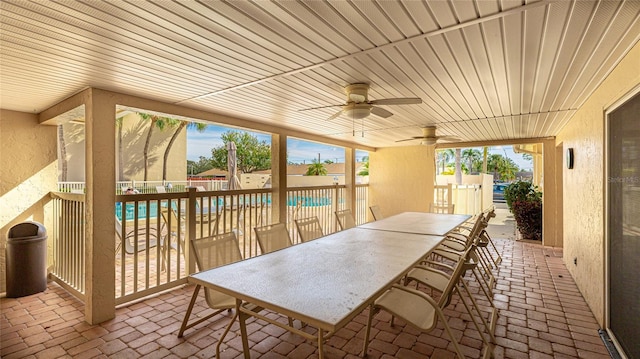 sunroom with wood ceiling