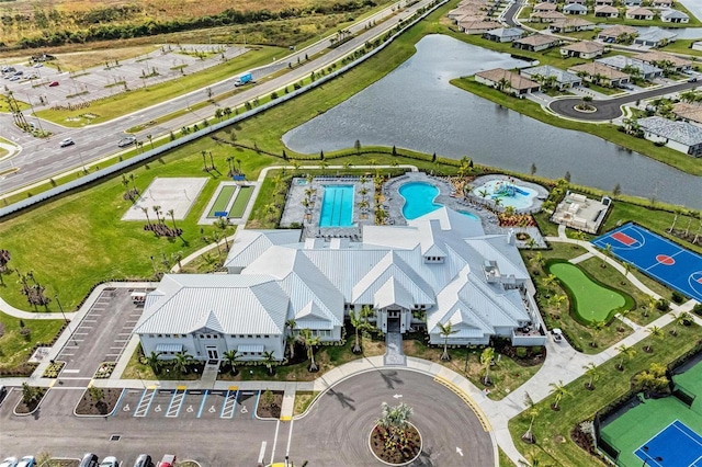 birds eye view of property featuring a water view