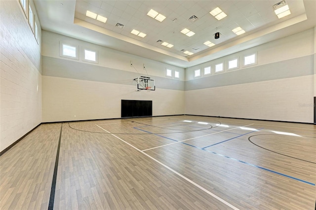 view of sport court with plenty of natural light