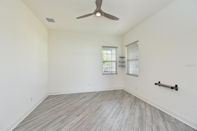 unfurnished room with ceiling fan and light hardwood / wood-style floors