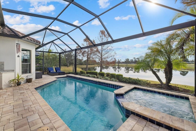 view of pool featuring a water view, an in ground hot tub, a lanai, and a patio area