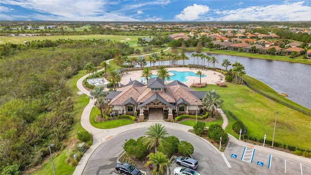 birds eye view of property featuring a water view