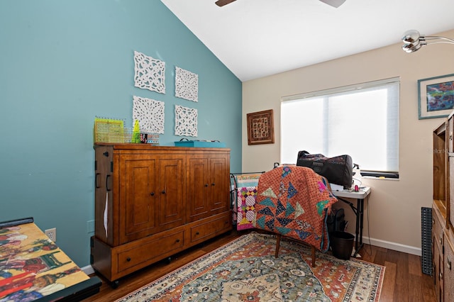 office featuring lofted ceiling, dark wood-type flooring, and ceiling fan