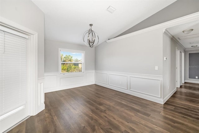 unfurnished dining area featuring an inviting chandelier, dark wood-type flooring, vaulted ceiling, and crown molding