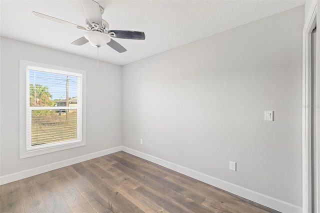 unfurnished room featuring hardwood / wood-style flooring and ceiling fan