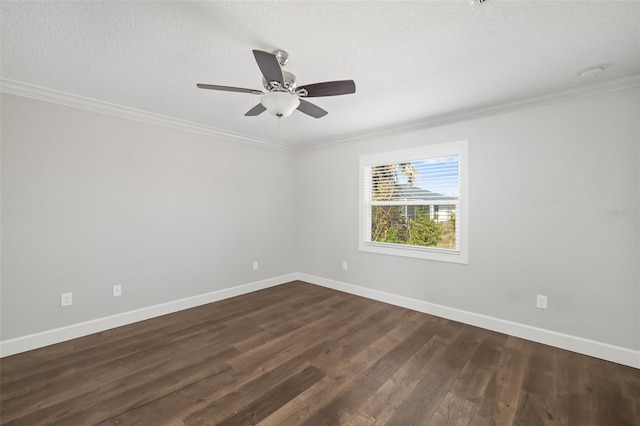 spare room with ceiling fan, crown molding, dark hardwood / wood-style floors, and a textured ceiling