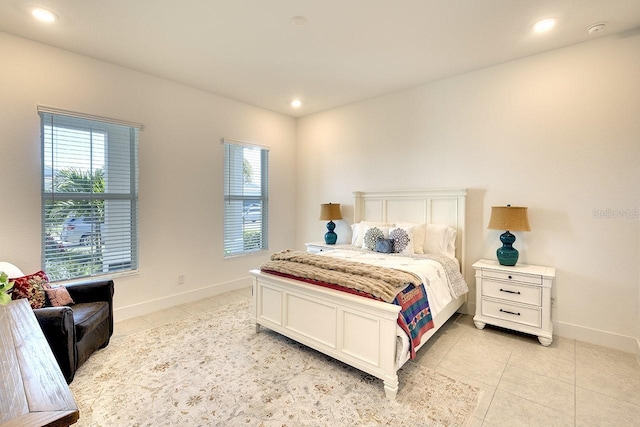 bedroom with light tile patterned flooring