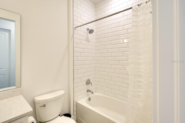 full bathroom featuring vanity, shower / bath combination with curtain, and toilet