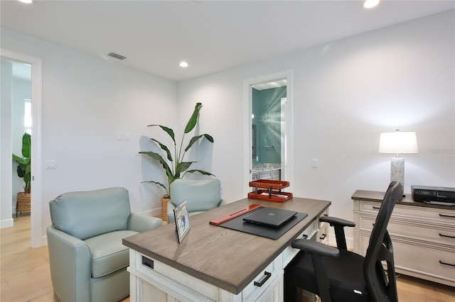 office space featuring light hardwood / wood-style flooring