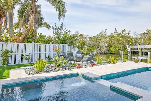 view of swimming pool featuring a patio area