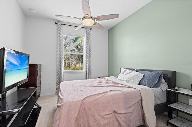 bedroom with light colored carpet and ceiling fan