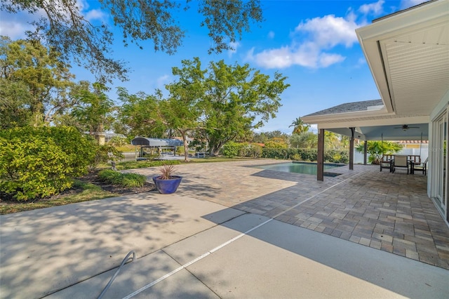 view of patio / terrace featuring ceiling fan