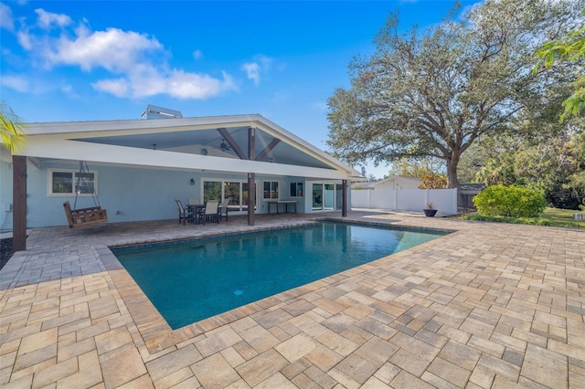 view of swimming pool featuring a patio area