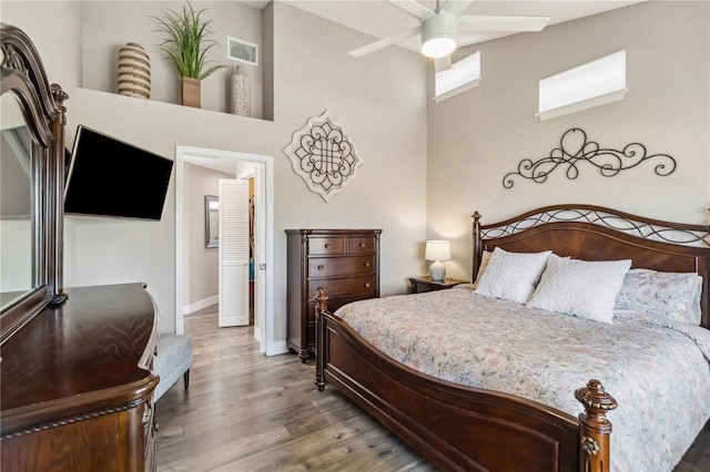 bedroom with hardwood / wood-style flooring