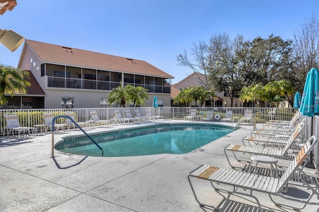 view of swimming pool featuring a patio