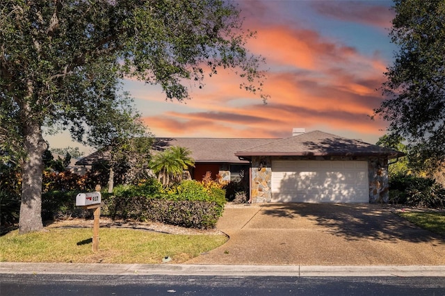 ranch-style home with a garage