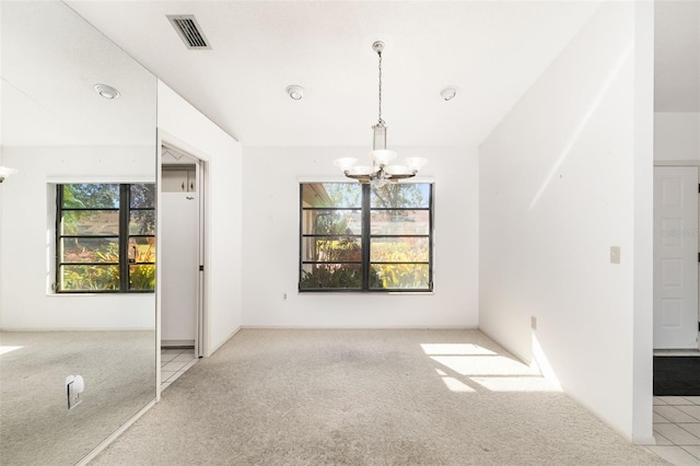 interior space featuring a chandelier