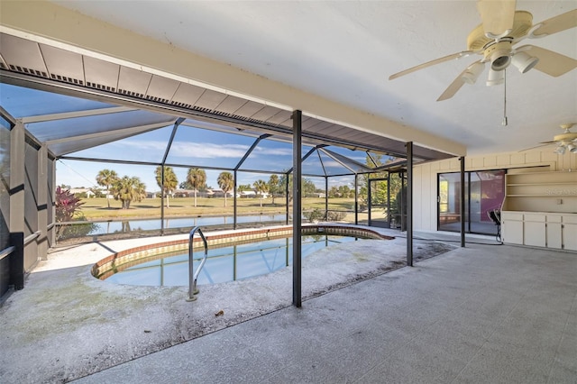 view of pool with a water view