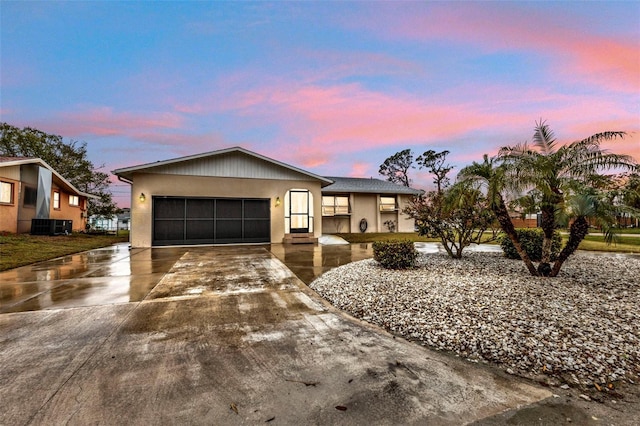 view of front of home with a garage