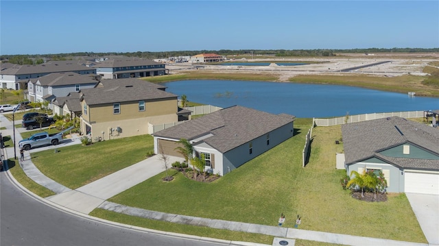 drone / aerial view featuring a water view