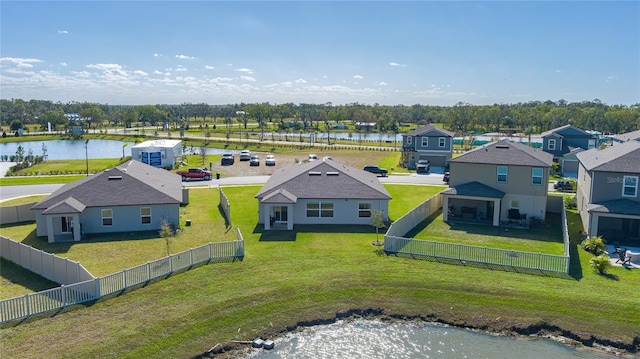 drone / aerial view featuring a water view