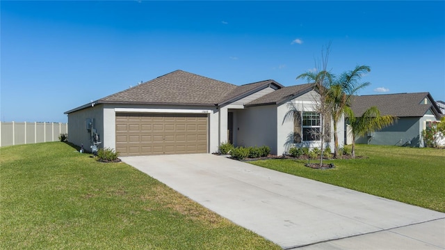 single story home with a garage and a front lawn