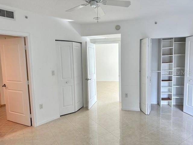 unfurnished bedroom with ceiling fan