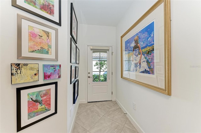 entryway featuring light tile patterned floors