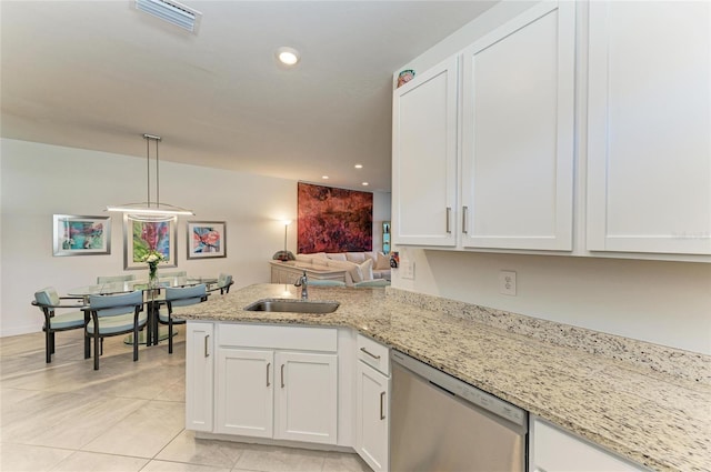 kitchen featuring sink, white cabinetry, dishwasher, kitchen peninsula, and pendant lighting