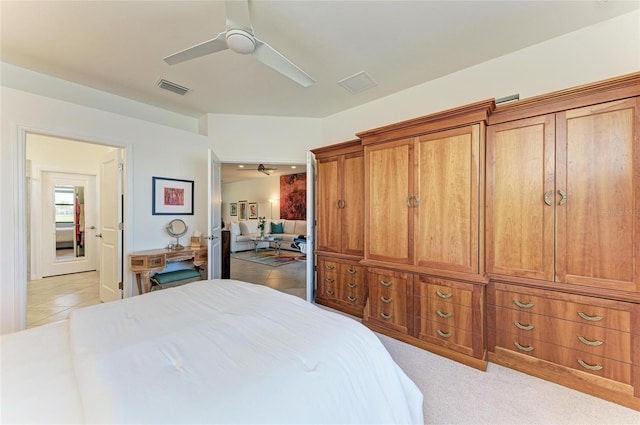 bedroom featuring light tile patterned floors and ceiling fan