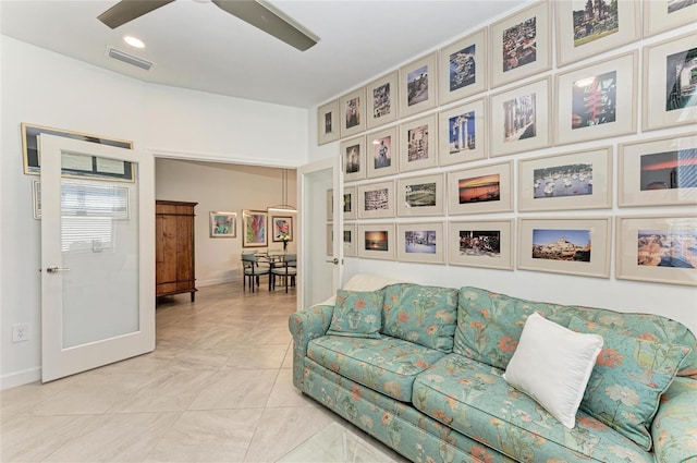 living room with ceiling fan