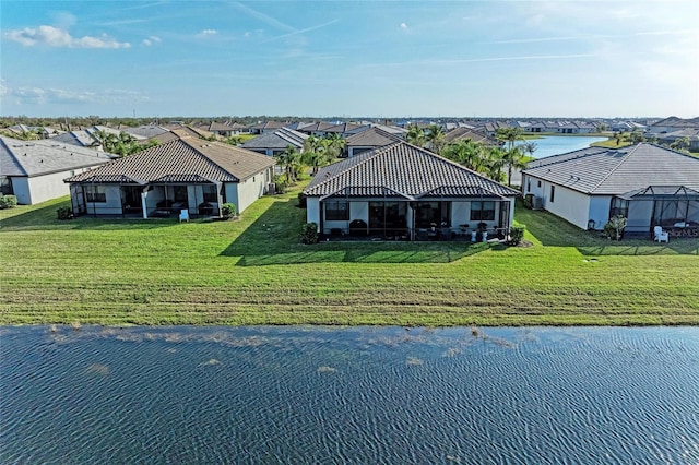 bird's eye view with a water view