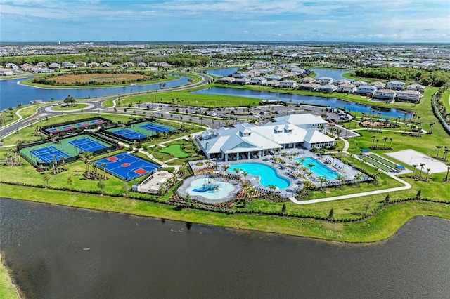 bird's eye view with a water view